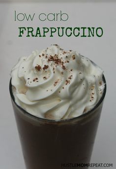 a close up of a drink with whipped cream on top and the words low carb frappuccino above it