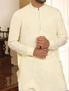 Men's Pakistani suits online for event of Eid 1 Luxury Men's Salwar Kameez For Eid, Fitted Cream Bandhgala For Semi-formal Occasions, Beige Long Sleeve Semi-formal Set, Off White Unstitched Bandhgala With Long Sleeves, Unstitched Off White Bandhgala With Long Sleeves, Cream Fitted Long Sleeve Nehru Jacket, Cream Long Sleeve Nehru Jacket With Naqshi, Cream Festive Bandhgala For Semi-formal Occasion, Festive Cream Bandhgala For Semi-formal Occasions