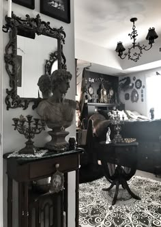 a living room filled with furniture and mirrors