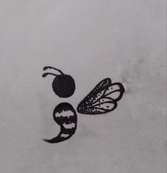 a black and white drawing of a butterfly