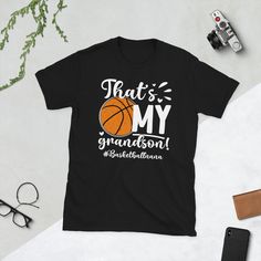 a black tshirt that says, that's my grandson basketball mom on it