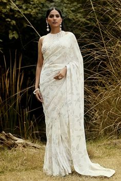 White pre-draped saree with sequin embellished floral patterns. Comes with padded bead and sequin embellished blouse. - Aza Fashions Saree Gowns, Dhoti Saree, Cotton Sarees Handloom, Draped Saree, Ruffle Saree, Drape Saree, Embellished Blouse, Lehenga Saree, Beaded Neckline