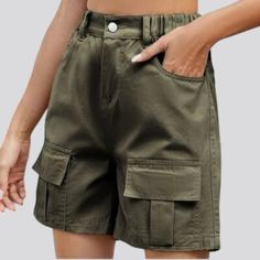 Add a pop of colorful to your summer wardrobe with our women's color cargo jean shorts from the 2024 Summer Collection.Distinctive Features: Fashion Forward: These cargo jean shorts are the epitome of chic, adding a touch of street vibe style to any outfit. Bold Color Palette: Drenched in a palette inspired by safari and elevated-rise fashion, these shorts are an ode to the season. Straight Leg Cut: Embrace the straight leg fit of these shorts that flatters any body type and adds a touch of sophistication. Safari-Inspired Cargo Pockets: The cargo pockets add a touch of utility and style, perfect for storing your essentials while on-the-go. Zippers and Buttons: The zipper and button closures add a touch of detail and make these shorts easy to put on and take off. Rubber Closure: The rubber Summer Khaki Cargo Pants With Built-in Shorts, Trendy Shorts With Pockets Short Length, Trendy Shorts With Pockets, Trendy Summer Shorts With Pockets, High-waisted Jean Shorts With Pockets For Summer, Summer High-waisted Jean Shorts With Pockets, Summer Cargo Shorts With Cargo Pockets, Khaki Shorts With Pockets For Summer, Khaki Summer Shorts With Pockets