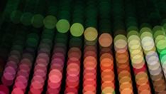 an image of colorful lights that are blurry in the night time, and can be used as a background or wallpaper