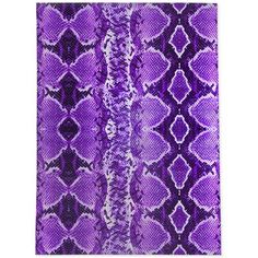 an abstract purple and white pattern on fabric