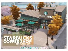 the starbucks coffee shop is located next to some trees