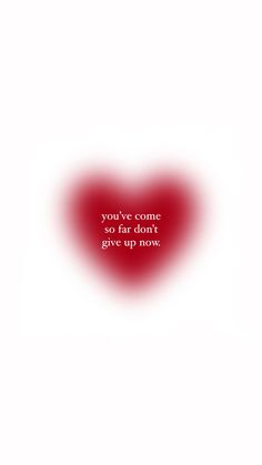 a red heart with the words just keep swimming written on it in white text, against a white background