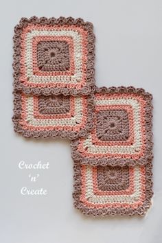 two crocheted coasters sitting next to each other