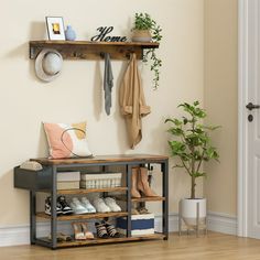 the entryway is clean and ready to be used as a shoe storage area for shoes