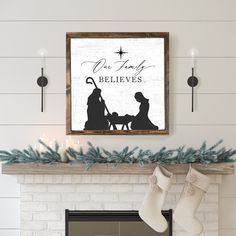 a christmas scene with stockings hanging from the mantel