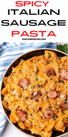 an image of a pasta dish with sausage and parmesan cheese in a skillet