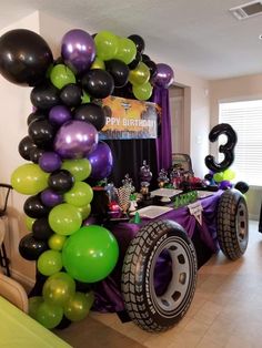 a birthday party with balloons and decorations