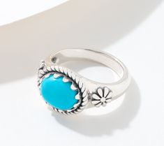 Gift yourself (or someone special) a great way to add some unexpected color and Southwestern style to your look with this gemstone concha ring. Unlike anything else in your jewelry collection, the oval-shaped gemstone cabochon sits in an east-west design with a serrated bezel, rope border, and concha flowers on either side. From American West Jewelry. Southwestern Turquoise Ring With Oval Cabochon, Southwestern Turquoise Oval Cabochon Ring, Southwestern Oval Cabochon Turquoise Ring, Southwestern Oval Gemstone Ring, Western Style Oval Gemstone Rings, Western Style Oval Rings For Gift, Oval Gemstone Western Rings, Southwestern Turquoise Oval Cabochon Ring As Gift, Adjustable Turquoise Oval Cabochon Ring