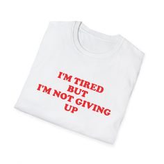 A motivational Y2K T-Shirt with the message 'I'm Tired but I'm Not Giving Up'. This funny and inspiring tee is a great gift shirt for anyone needing a boost of positivity. The lightweight and durable fabric make it perfect for everyday wear, delivering a versatile style that can match any occasion. Product features - Made from 100% ring-spun cotton for a lightweight and comfortable feel - Classic fit with crew neckline for a clean and versatile style - Ethically grown and harvested US cotton for Y2k Tshirt, Y2k T Shirt, Not Giving Up, I'm Tired, Im Tired, Top Funny, Versatile Style, Giving Up, Gender Neutral