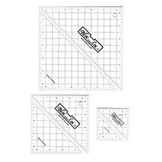 three rulers with the same line on each side, and one ruler in different positions