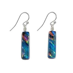 a pair of earrings with blue, green and purple glass in the shape of rectangles