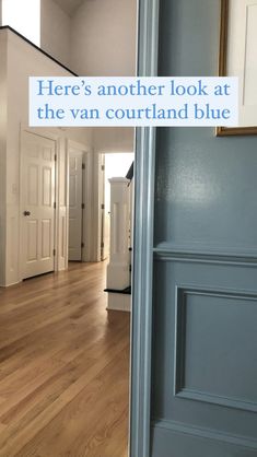 there's another look at the van courtland blue sign in front of an open door