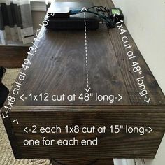 a wooden table with measurements on it