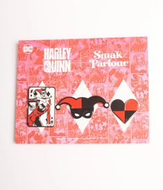 A cheeky pin set, in collaboration with DC Comics Harley Quinn, featuring a triple set of enamel pins boasting a playing card of Harley, a red and black checkered heart, and red and black homage to her infamous jester hat. Secured with butterfly clutch backs. Imported Enamel & Metal Butterfly Clasp Pin Back Set Of 3 Size ranges 1.25” x 2.25” Harley Quinn Jewelry, Retro Umbrella, Roaring 20s Fashion, Retro Inspired Fashion, Jester Hat, Mad Love, Metal Butterfly, Black Checkered, Vintage Inspired Fashion