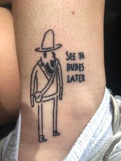 a person with a tattoo on their ankle that reads see ya dudes later,