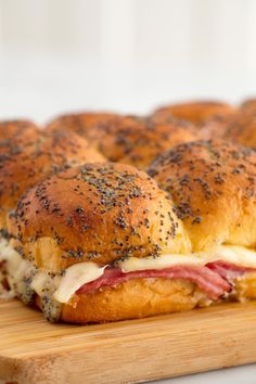 a close up of a sandwich on a cutting board