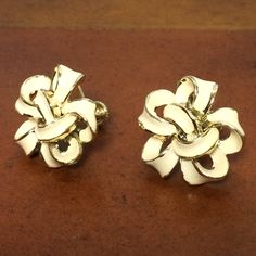 "Vintage Coro Signed, Silver Tone, White Enamel, Floral, Screw Back, Clip-on Earrings, 1950's Beautiful and unique earrings, looks like a ribbon tied into a flower shaped bow. They measures about 7/*8\" x 1\" long. Excellent vintage condition. Screw back hardware intact and secure with no notable issues. PLEASE SEE PHOTOS FOR MORE DETAILS, AND MESSAGE ME WITH ANY QUESTIONS." Fiddle Leaf, Fiddle Leaf Fig, Recycled Items, Ribbon Tie, Screw Back Earrings, Top Photo, White Enamel, Flower Shape, Unique Earrings