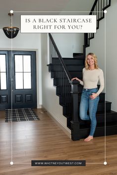 Whitney standing in front of a black staircase Black Wood Stair Railing, Dark Staircase Ideas, Black Railing Stairs, Black Banister, Painted Wood Stairs, Black Painted Stairs, Dark Staircase, Wood Railings For Stairs