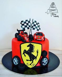 a birthday cake with a ferrari car on top