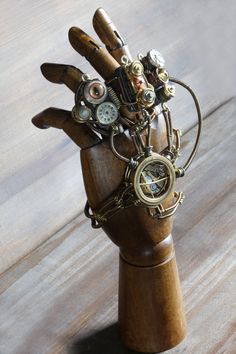 Steampunk mechanical hand by CatherinetteRings Steampunk Gadgets, Steampunk Items, Steampunk Aesthetic, Beautiful Halloween, Art Steampunk