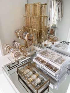 a display case filled with lots of gold jewelry