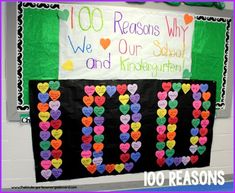 a bulletin board with hearts on it and the words 100 reasons why we are our school