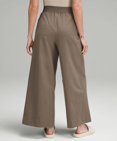 These High-Rise, Wide-Leg Crops Flow With Your Every Move For An Easy Approach To Your Daily Routine. Designed For Casual. Relaxed Fit Is Roomy Through Glutes And Thighs:sits Away From Body, Hip To Hem:intended To Sit Above Ankle. Hand Pockets With Hidden Card Sleeve. | Stretch Woven High-Rise Wide-Leg Cropped Pant Lululemon Relaxed Fit Loungewear Bottoms, Versatile Lululemon Bottoms With Elastic Waistband, Lululemon Cotton Bottoms With Elastic Waistband, Lululemon Cotton Bottoms For Summer, Lululemon Summer Bottoms With Pockets, Versatile Relaxed Fit Lululemon Pants, Lululemon Relaxed Fit Versatile Pants, Lululemon Relaxed Fit Full Length Pants, Lululemon Relaxed Fit Full Length Bottoms