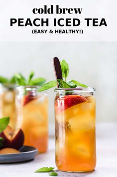 two mason jars filled with iced peach tea