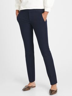 Front off-seam pockets.  Rear welt pockets.  Unlined.  Straight-cut waistband.  Zip fly with hook-and-bar closure.  Belt loops.  A sleek new pant in a modern fit.  The Ryan offers a leg-lengthening slim-straight silhouette.  Flat front.  Trouser crease.  Made with our favorite bi-stretch fabric with excellent stretch and recovery to smooth and sculpt your shape.  Ryan Fit: Mid-rise.  Straight through the hip and thigh.  Straight leg opening.  Inseams: Petite/Short 28", Regular 30", Long 33".  Mo Petite Shorts, New Pant, Stretch Pants, Straight Cut, Modern Fit, Welt Pockets, Welt Pocket, Stretch Fabric, Mid Rise