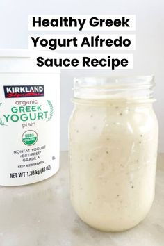 healthy greek yogurt alfredo sauce recipe in a mason jar with text overlay reading healthy greek yogurt alfredo sauce recipe