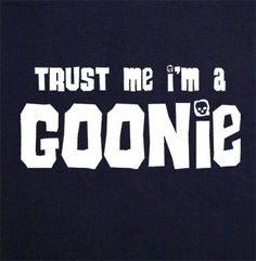 the words trust me i'm a goonie in white on a black background