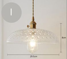 an image of a light fixture with measurements for the size and width on it's side