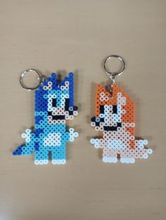 two key chains made out of perler beads