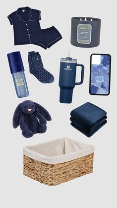 various items are arranged in the shape of a basket, mug, socks, and blanket