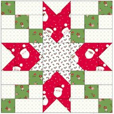 a christmas quilt block with santa's hat and holly wreaths on the center