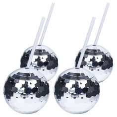 three chrome balls with white handles on each one and two poles sticking out of the top