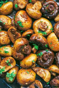 cooked mushrooms with parsley on top