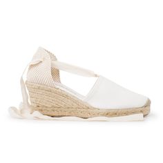 100% Vegan, Organic and Sustainable. Authentic Espadrilles, Handcrafted by Artisans. Designed in Barcelona, Made in Spain These organic cotton lace-up wedges are inspired by the Mediterranean and designed for breathability, comfort, and style. Made in Spain, these are an authentic pair of exquisite, espadrilles - made by artisans who preserve centuries-old traditions of shoemaking. * Lightweight Summer Espadrilles * Authentic. Made by artisans in Spain * Designed for breathability, style, and comfort * 6.35cm heels = 2.5" inches Wedge height * Soft cotton ankle tie laces * 100% Organic Cotton Canvas Upper * Comfortable and cushioned insole * Natural jute midsole with a vulcanized rubber sole * Wear with just about anything - summery dress, cute shorts, fave jeans & more! White, lace-up, ro Design With Rope, Spanish Espadrilles, Womens Espadrilles Wedges, Spain Design, White Wedges, Women's Espadrilles, Lace Up Wedges, Vegan Shoes, The Mediterranean