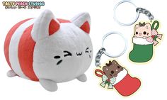 a small stuffed animal keychain with an image of a cat on it