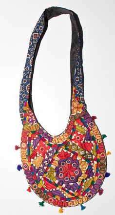 Experience the elegance of tradition with our Sindhi Handmade Embroidery Handbag. This exquisite handbag is a celebration of the rich cultural heritage of Sindh, meticulously crafted by skilled artisans who pour their passion and expertise into every stitch. Traditional Handmade Multicolor Hobo Bag, Rectangular Handwork Festival Bag, Traditional Bags With Floral Embroidery For Daily Use, Festival Rectangular Bags With Multicolor Embroidery, Handmade Multicolor Embroidered Potli Bag For Festivals, Festival Red Shoulder Bag With Handwork, Red Shoulder Bag With Handwork For Festivals, Multicolor Handwork Bags For Festive Occasions, Festive Floral Embroidered Shoulder Bag For Festivals