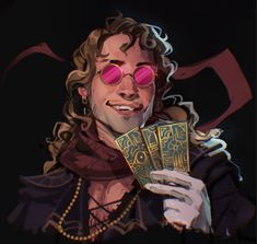 a man with red glasses holding up some cards