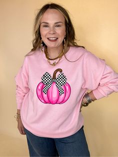 Add a pop of color to your wardrobe with our Pretty in Pink Pumpkin Graphic Sweatshirt! This fun design features a playful hot pink pumpkin adorned with a chic black and white checked bow on top. Available in multiple color options, including black, pink, white, and cream, this sweatshirt is perfect for making a statement. Stand out in style and showcase your love for all things autumn with this must-have piece! *Please note that these graphics are digital mockups and may vary from the final pro Cute Plaid Tops For Fall, Pink T-shirt For Fall, Hot Pink Pumpkin, Pink Panache Jewelry, Julie Vos Jewelry, Bow Graphic, Pumpkin Graphic, Pink Pumpkin, Jazz Shoes