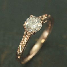 an engagement ring with a diamond in the center