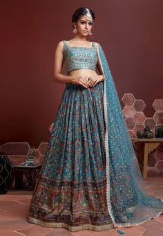 Sky blue chinon silk circular lehenga choli 106 Desc: Style : Circular Lehenga Choli Color : Sky Blue Fabric : Chinon Silk Work : Embroidery Wash Care : Dry clean Sleeve Style : Sleeveless Long Sleeves : Done only in Custom Stitch Sleeves Lining : Done only in Custom Stitch Bust Size : 32 to 42 Inches Occasion : Wedding Festival Mehendi Sangeet Reception Ceremonial Baby Shower. With Express Free Shipping Buy Indian Party wedding wear Bridal Lehenga Choli Sky blue chinon silk circular lehenga cho Blouse Lehenga, Gold Lehenga, Party Wear Lehenga Choli, Bollywood Lehenga, Blue Lehenga, Lehenga Style, Lehenga Skirt, Lehenga Choli Online, Silk Bottoms