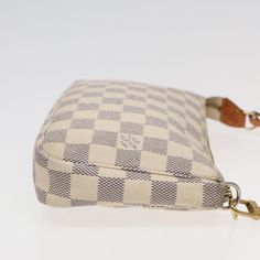 Brand: Louis Vuitton Model: Pochette accessoires Color: White Material: Canvas Inclusions: / Dimensions: W21cm x H13cm x D3cm Serial number: CA0057 Country of origin: Spain Condition: AB - good condition. This Louis Vuitton Pochette Accessoires in Damier Azur canvas is a chic and practical pouch designed for women. Made in Spain, its timeless Damier Azur pattern adds elegance to any outfit. The exterior shows some loss of shape, rubbing, staining, and partial tearing. The handle exhibits sunburn Luxury Square Pouch, Classic Monogram Canvas Pouch For Everyday Use, Louis Vuitton Cherry Blossom White Pochette, Louis Vuitton Wallet Women White, Louis Vuitton Damier Azur Pochette, Canvas Clutch, Louis Vuitton Damier Azur, Louis Vuitton Pochette, White Canvas